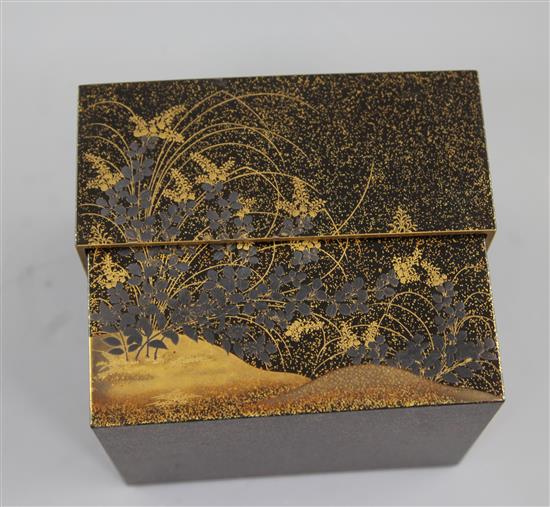 Three Japanese gilt and silver decorated lacquer boxes, late 19th / early 20th century, both 8cm